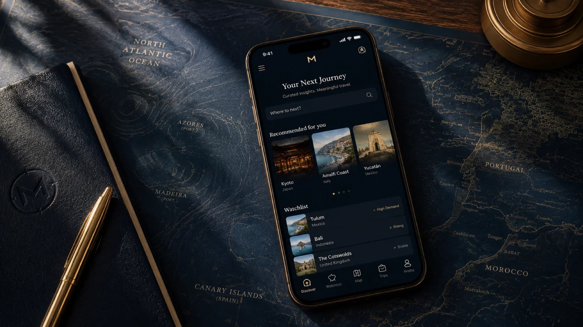The MAPPA app open on a phone resting on an antique navigational chart